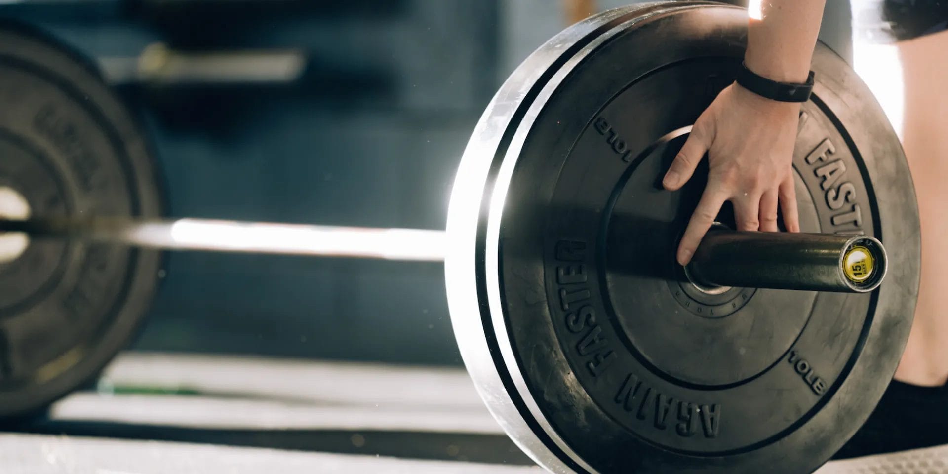 Fisher Lifting Setting up Barbell